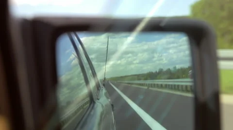 Side-view mirror in a vintage car. Passing emergency phone. Video stock 68028401