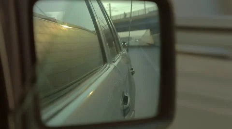 Side-view mirror in a vintage car. Driving along the highway. Stock Footage 68028932