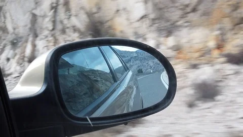 Side view mirror while driving - slow motion Video stock 102672429