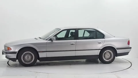 A side view of a modern classic sedan Stock Footage 243372551