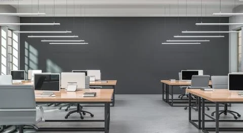 Side view of a modern office with a grey wall. Rows of tables, equipped Stockillustratie