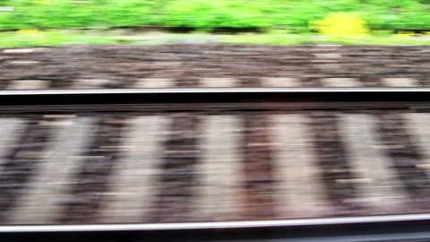Side view in motion of train tracks Stock Footage 133425737