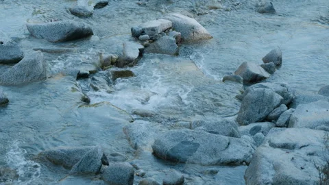 Side View of Mountain River Flowing Among White Stones Stock Footage 320213920