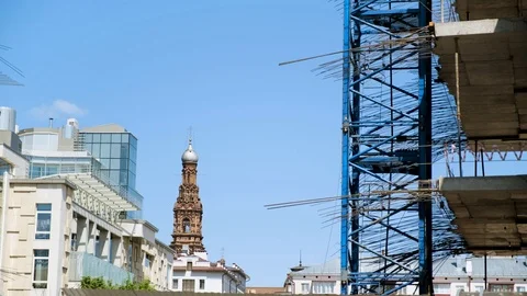 Side view of a new multi storey building under construction. Stock footage. The Vídeo Stock 119636909