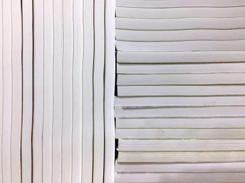 Side View of Notebooks Arranged Vertically and Horizontally Stock Photos