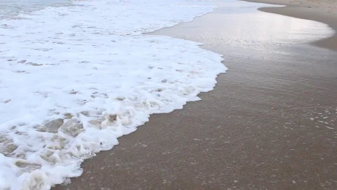 Side View Ocean &amp; Sand Water Rushes Up Beach Stock Footage 106674223