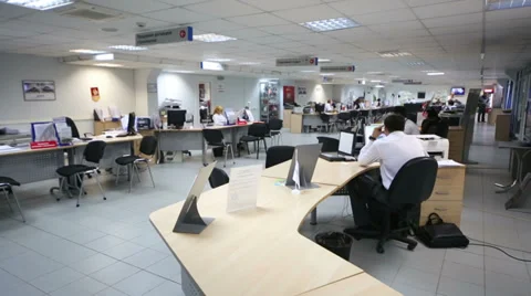 Side view to office with tables and computers in dealership Video stock 37659074