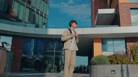 Side view One Man's Quest for Education University Garden Stock Footage 327199506