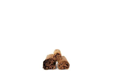 Side view of organic ceylon cinnamon sticks, aromatic ingredient, spice. Stock Photos