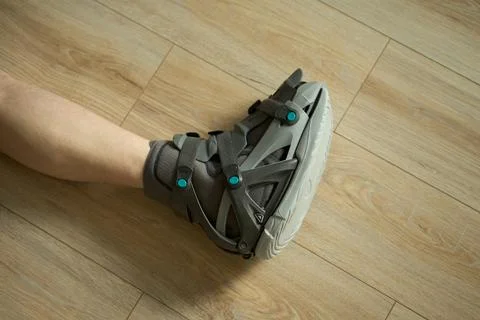 Side View of Orthopedic Walking Boot on Leg. Stock Photos