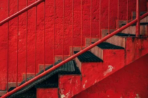 Side view of outdoor staircase steps with black rubber treads against a bri.. Stock Photos