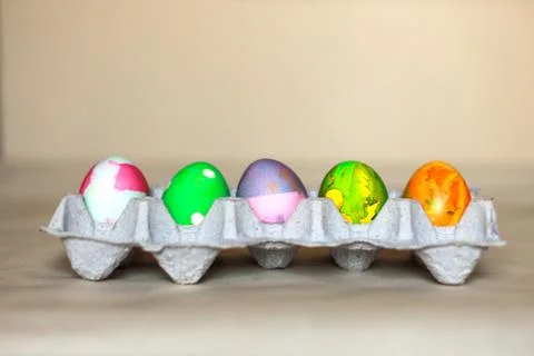 Side view of a paper tray with easter eggs Stock Photos