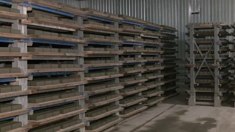 Side view of paving slabs drying on factory shelves. Stock Footage 263580687