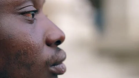 Side view of pensive black migrant. Close up Stock Footage 218601520