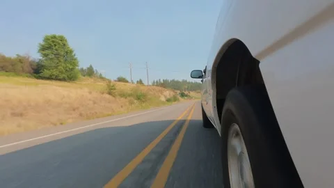 Side View of Pickup Truck Driving Along Rural Highway in Eastern Washington 4K Stock Footage 341501876