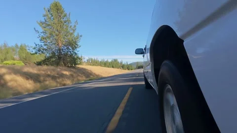 Side View of Pickup Truck Driving Along Rural Highway in Eastern Washington 4K Stock Footage 341502809