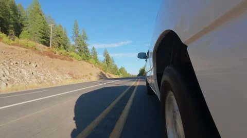 Side View of Pickup Truck Driving Along Rural Highway in Eastern Washington 4K Stock Footage 341504530