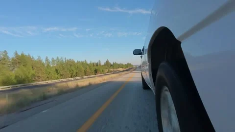 Side View of Pickup Truck Driving Along Rural Highway in Eastern Washington 4K Stock Footage 341506349