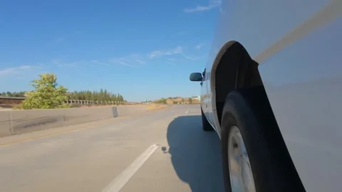 Side View of Pickup Truck Driving Along Rural Highway in Eastern Washington 4K Stock Footage 341506494