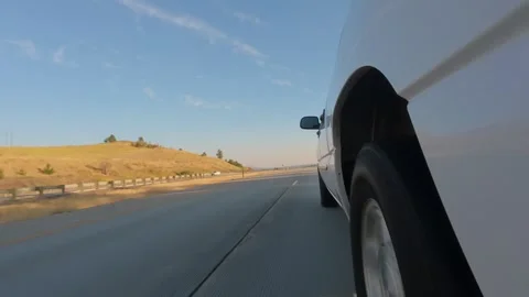 Side View of Pickup Truck Driving Along Rural Highway in Eastern Washington 4K Stock Footage 341506677