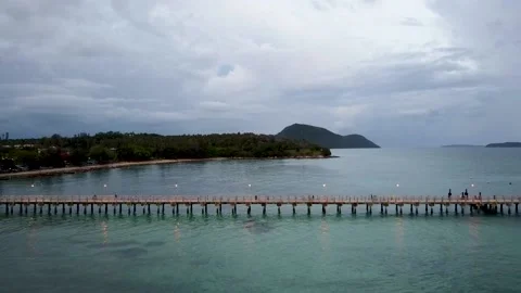Side view of a pier in the tropics from a drone Stock Footage 166781150