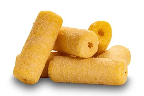 Side view pile of crispy roller corn snack isolated on white background. Stock Photos