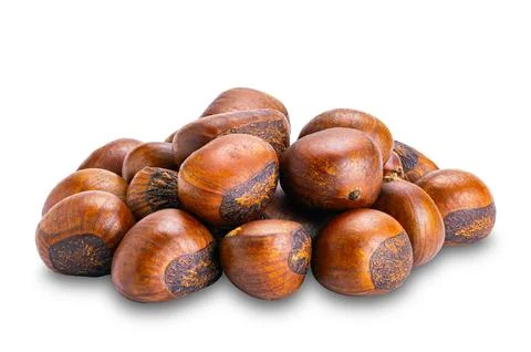 Side view pile of roasted chestnuts isolated on white background. Stock Photos