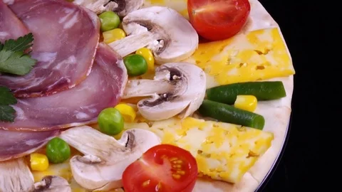 Side view of pizza before baking close up, rotating clockwise with side center Stock Footage 84113611
