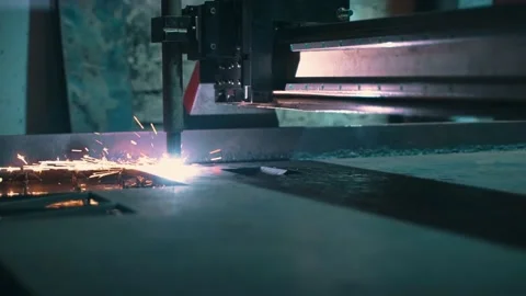 Side view of plasma metal processing on a robotic machine. Stock Footage 226331355