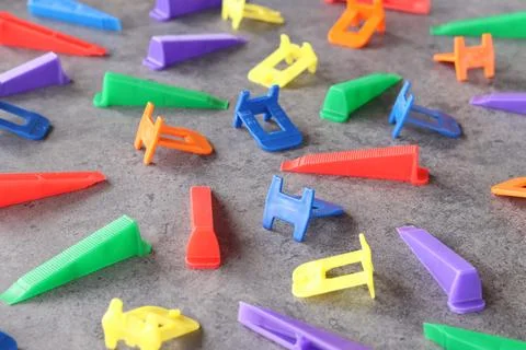 Side view of plastic wedges and clamps Stock Photos