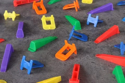 Side view of plastic wedges and clamps Stock Photos