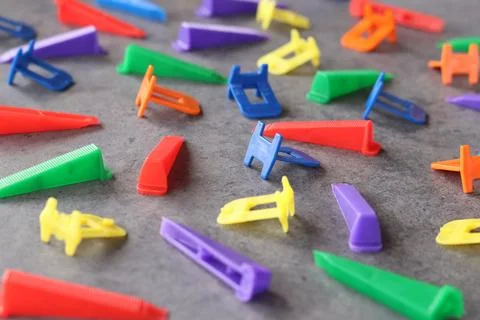 Side view of plastic wedges and clamps Stock Photos