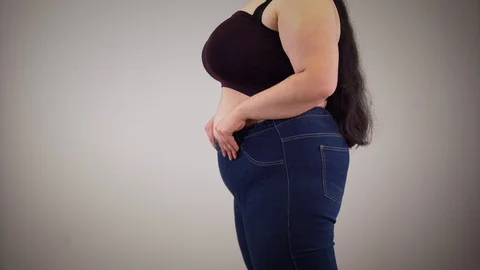 Fat Woman Jeans Stock Footage ~ Royalty Free Stock Videos