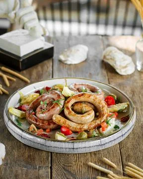 Side view on portion of grilled sausages Stock Photos