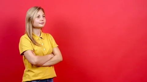 Side view portrait of a beautiful and confident young woman in a yellow T-shirt Stock Footage 140792156