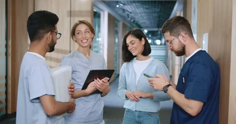 Side view portrait of diverse group of young skilled medical professionals Video stock 256173279