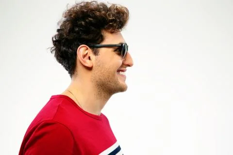 Side view portrait of a happy man in sunglasses Stock Photos