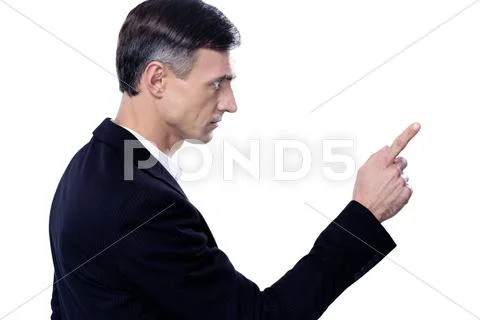 Side view portrait of a man pointing to something Stock Photos