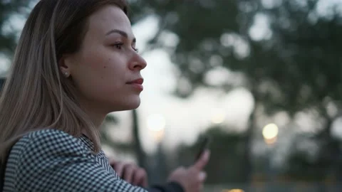 Side view portrait of a young beautiful sad woman, close-up Stock Footage 237555353