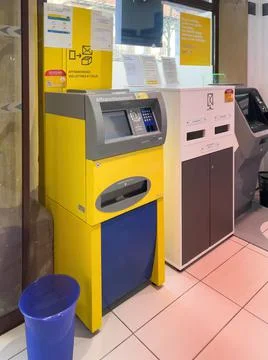 Side view of postage meter machines named Lisa Libre Service Affranchissement Stock Photos