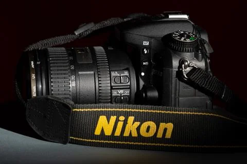 Side view of a professional DSLR camera from Nikon D7100 with 16-85mm f3.5 .. Stock Photos