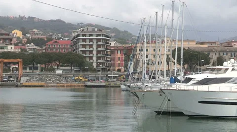Side view of prows of boats moored in the port of Chiavari Stock Footage 57541720