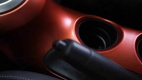 Side view rail video of gear shift knob in leather vehicle interior Video stock 169029838