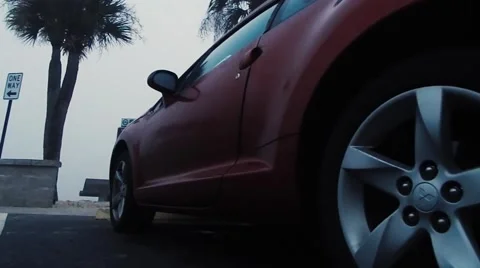 Side view of red car Vídeos de archivo 45229047