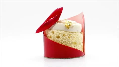 Side View Of A Red Gourmet Dessert Rotating On A White Background, UK Stock Footage 153501281