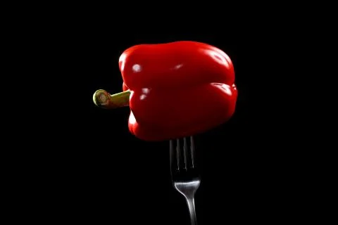 Side view of red pepper on fork on black background. Domestic cultivation. Fr Stock Photos