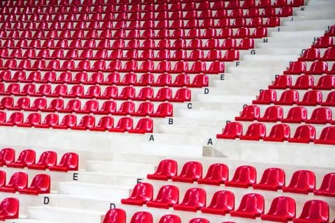 Side view red stadium seats Stock Photos