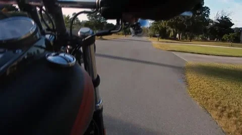 Side view riding fast on harley davidson motorcycle Video stock 45296462