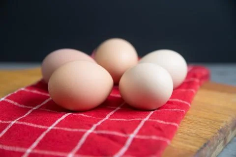 Side view of a ring of cage free brown eggs ready for a recipe Stock Photos