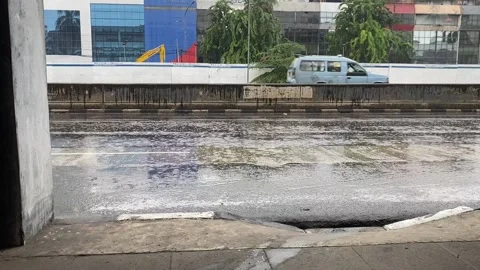 Side view of road in jakarta while rain Stock Footage 287314829